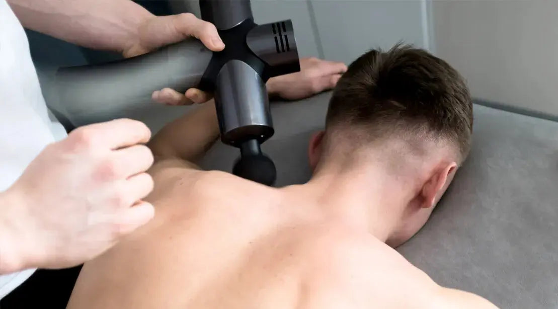 Massage gun with a compact carrying case and accessories, ideal for travel and on-the-go muscle recovery